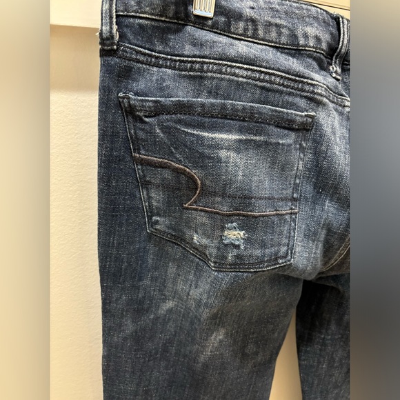 Dark and distressed vintage American Eagle jeans - Picture 2 of 4